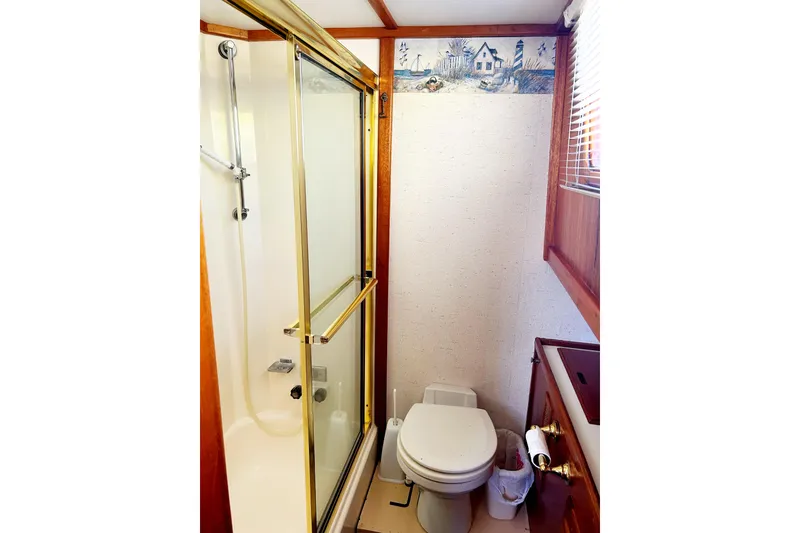 Slide: The Image of Bathroom interior of 1980 Californian 42 LRC yacht with shower and toilet. - 28
