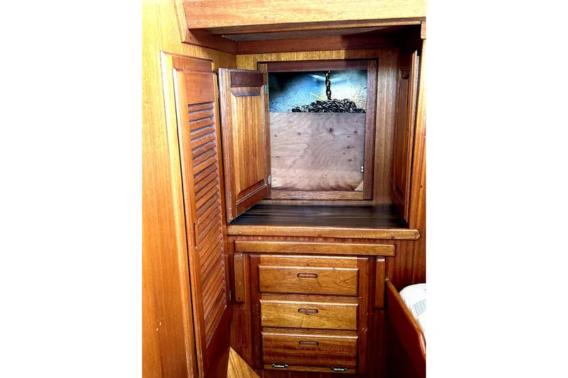 Slide: The Image of 1980 Californian 42 LRC wooden interior with drawers and cabinet. - 57
