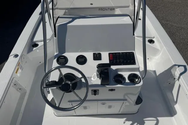 Slide: The Image of 2026 Frontier 2104 boat console with steering wheel and control panel. - 10