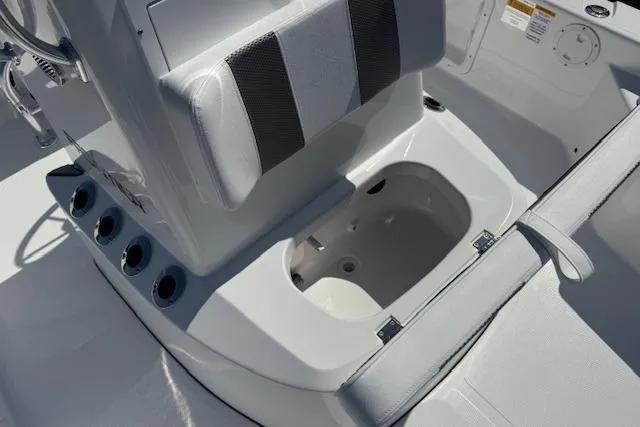 Slide: The Image of 2026 Frontier 2104 boat interior with seating and storage compartment. - 12