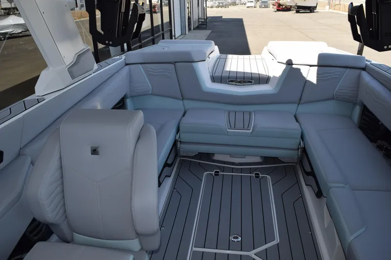 Slide: The Image of 2025 Nautique Super Air Nautique G23 Paragon interior with luxurious seating and modern design. - 10
