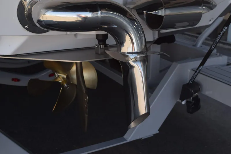 Slide: The Image of 2025 Nautique Super Air Nautique G23 Paragon boat exhaust and propeller detail. - 21