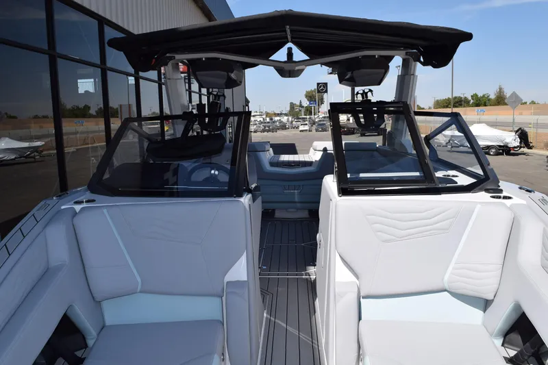Slide: The Image of 2025 Nautique Super Air Nautique G23 Paragon interior with sleek seating and modern design. - 5