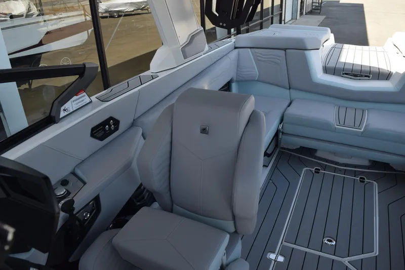 Slide: The Image of Interior of 2025 Nautique Super Air Nautique G23 Paragon, featuring luxurious seating and modern design. - 9