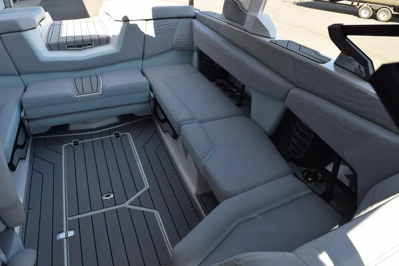 Slide: The Image of 2025 Nautique Super Air Nautique G23 Paragon interior with luxurious seating and sleek design. - 11