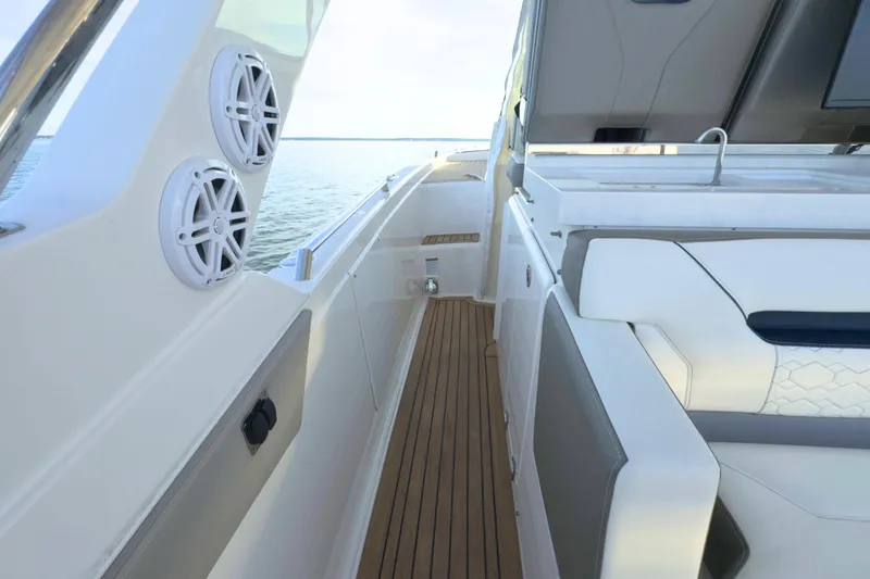 Slide: The Image of 2022 Tiara Yachts 34 LS interior with sleek seating and modern design. - 27