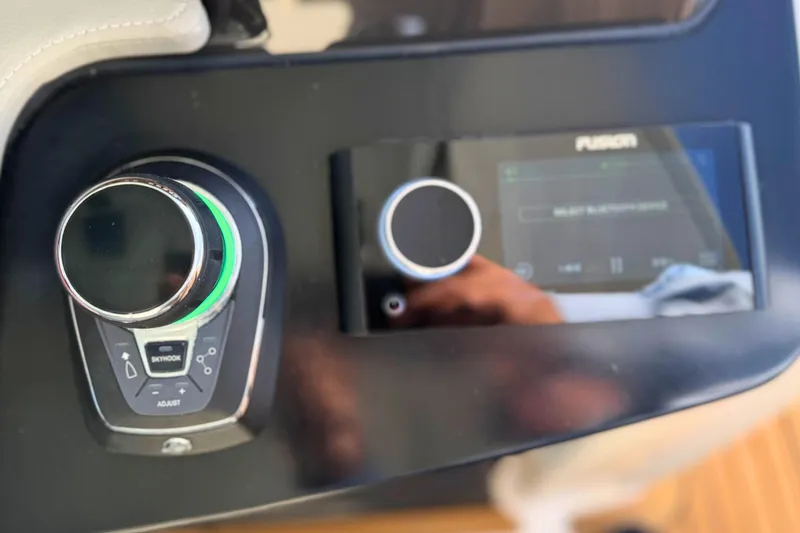 Slide: The Image of Control panel of 2022 Tiara Yachts 34 LS with joystick and touchscreen display. - 31