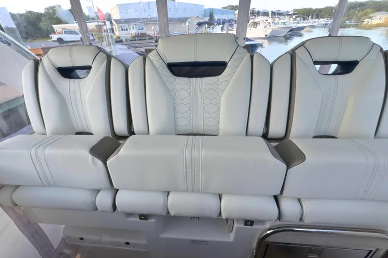 Slide: The Image of Luxurious seating on 2022 Tiara Yachts 34 LS, featuring elegant design and comfort. - 36