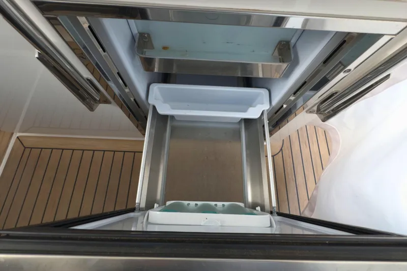 Slide: The Image of Open drawer on 2022 Tiara Yachts 34 LS, showcasing interior storage space. - 40