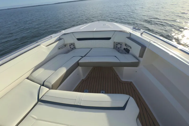 Slide: The Image of 2022 Tiara Yachts 34 LS boat interior with luxurious seating and ocean view. - 45