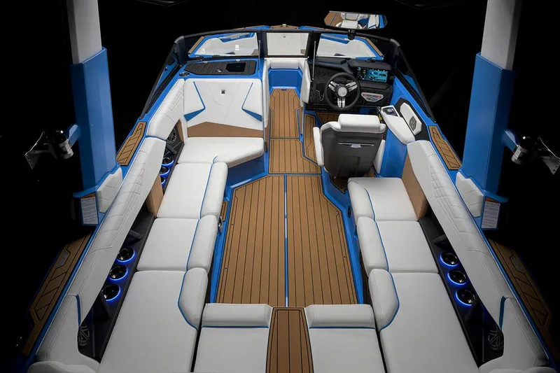 Slide: The Image of Manufacturer Provided Image: 2025 Nautique Super Air Nautique S23 interior with luxurious seating and modern dashboard. - 26
