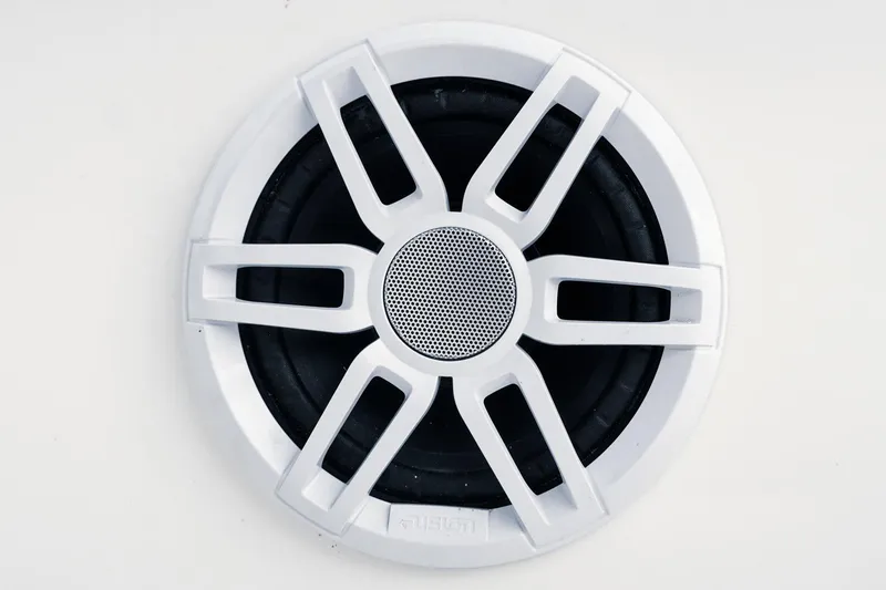 Slide: The Image of White speaker grille on a 2025 Skeeter SX2350 boat, featuring a modern design. - 10