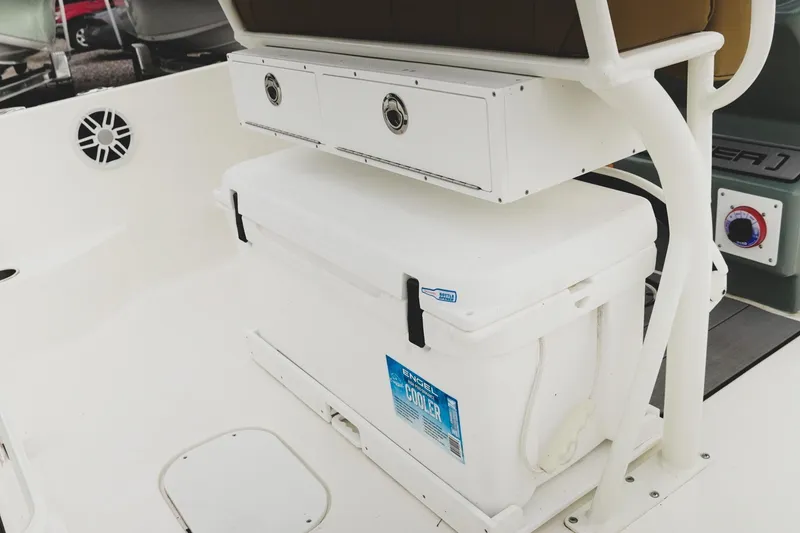 Slide: The Image of 2025 Skeeter SX2350 boat interior with Engel cooler and storage drawers. - 11