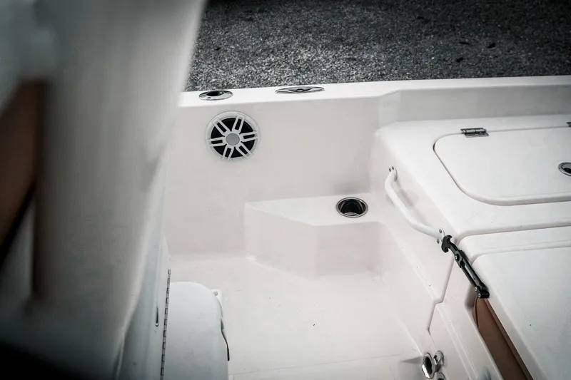 Slide: The Image of 2025 Skeeter SX2350 boat interior with speaker and storage compartments. - 20