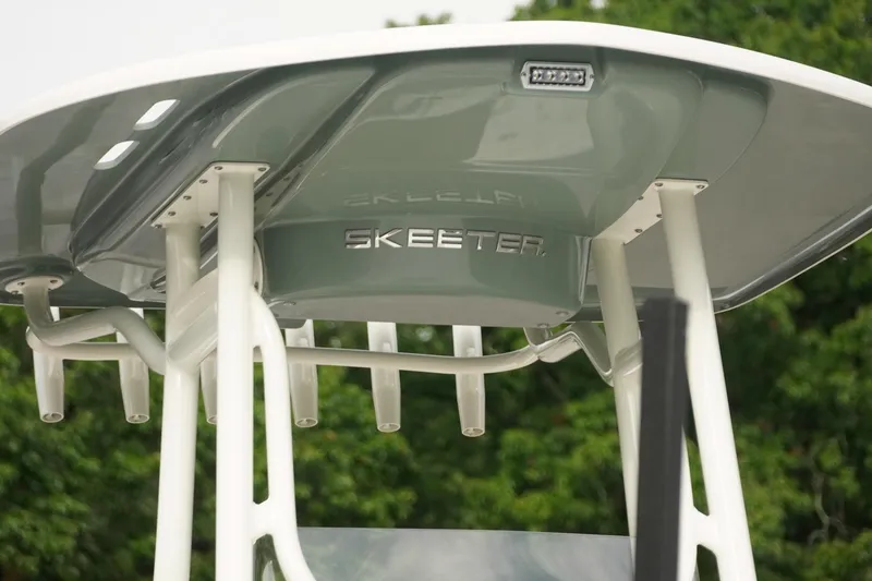 Slide: The Image of 2025 Skeeter SX2350 boat canopy with rod holders and LED light. - 23