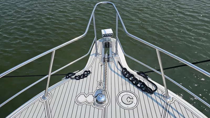 Slide: The Image of Bow of 1999 Sea Ray 500 Sundancer yacht with stainless steel railings. - 10