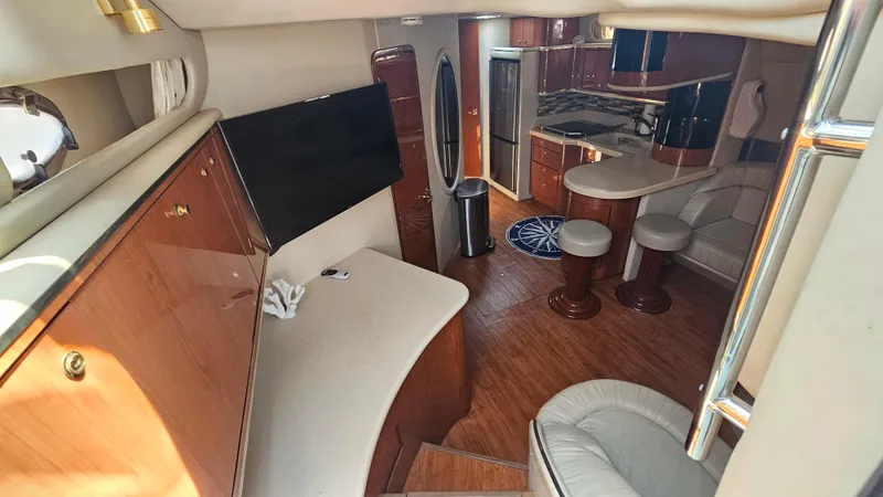 Slide: The Image of Luxurious interior of 1999 Sea Ray 500 Sundancer yacht with modern amenities. - 23