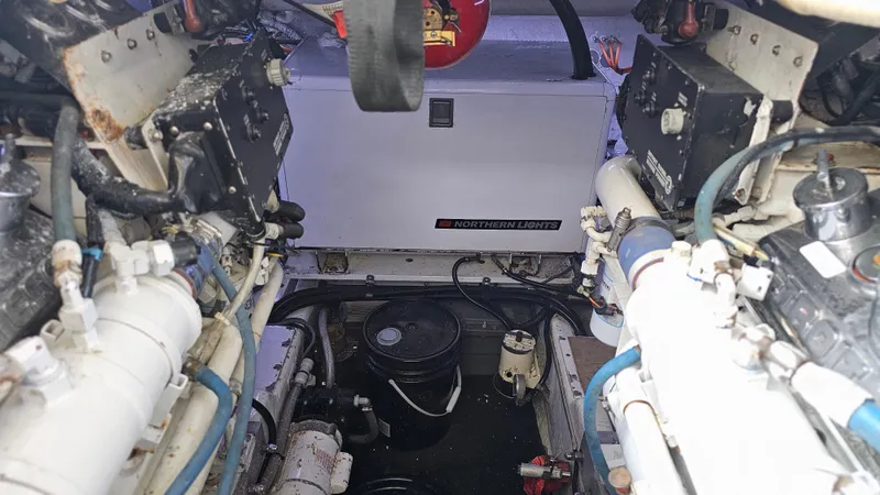 Slide: The Image of Engine room of 1999 Sea Ray 500 Sundancer with Northern Lights generator. - 43