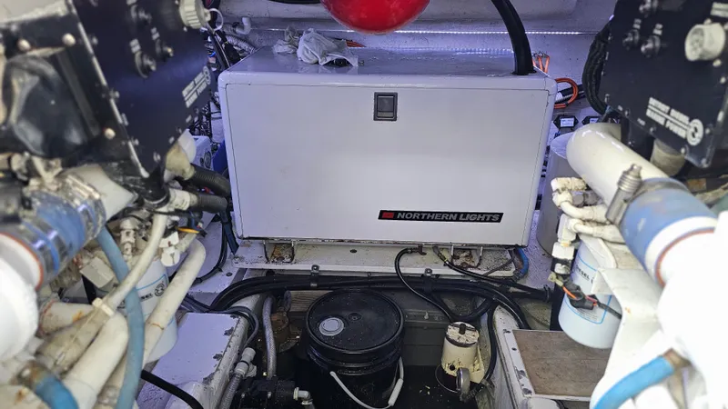 Slide: The Image of Engine room of 1999 Sea Ray 500 Sundancer with Northern Lights generator. - 47
