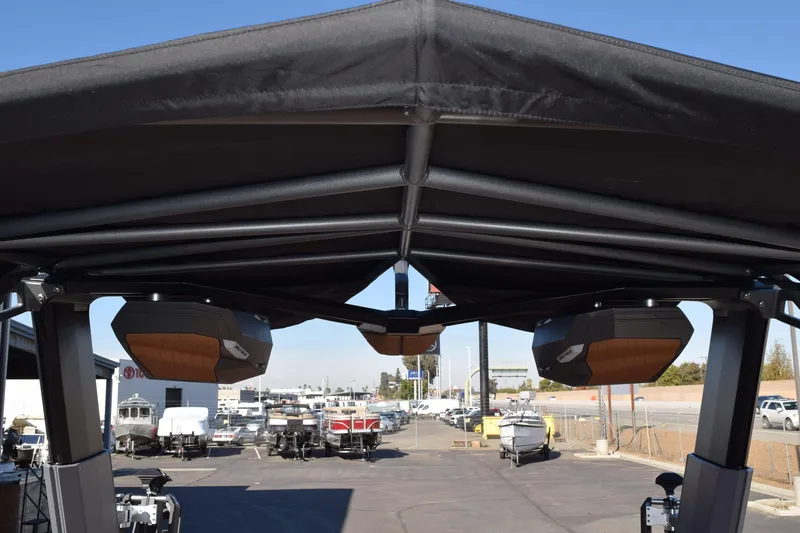 Slide: The Image of 2025 Nautique Super Air Nautique G23 Paragon boat speakers under canopy. - 17