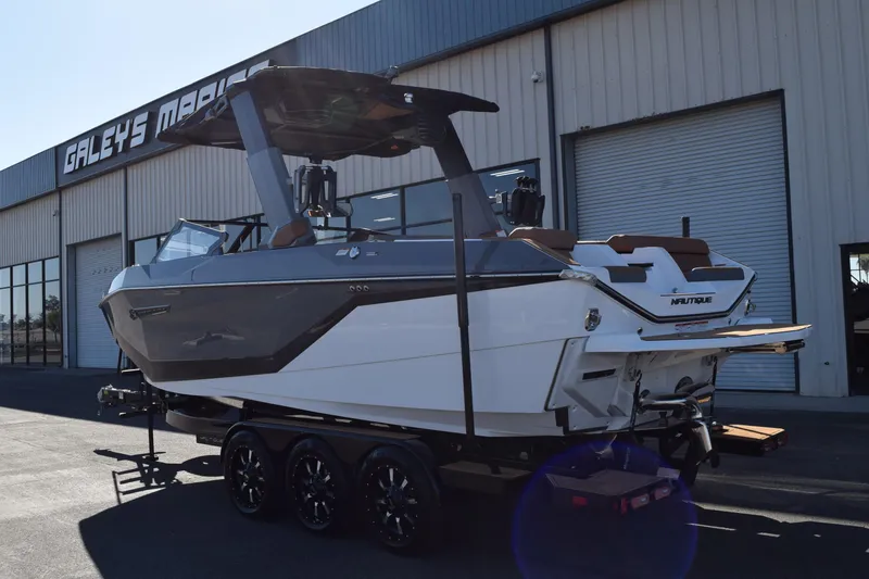 Slide: The Image of 2025 Nautique Super Air Nautique G23 Paragon boat on trailer at Galey's Marine. - 2