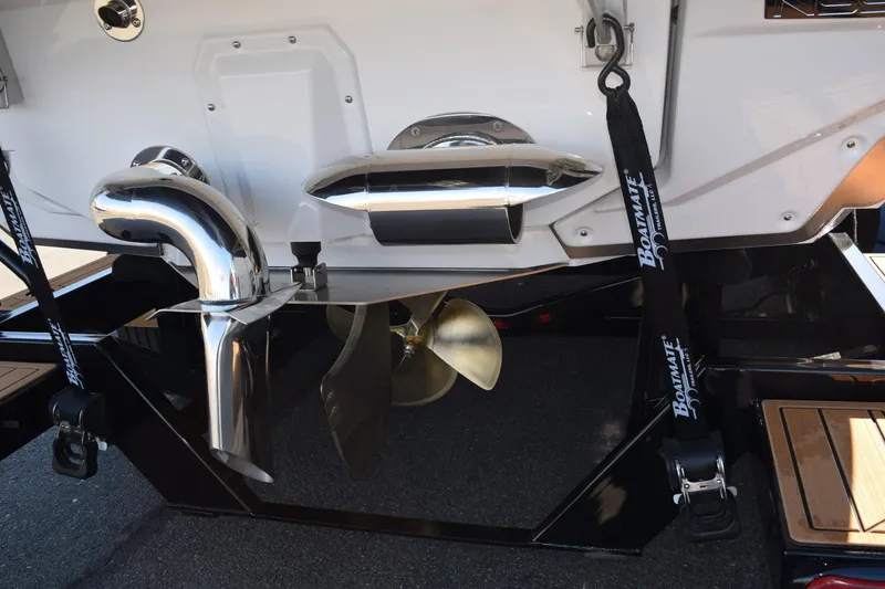 Slide: The Image of 2025 Nautique Super Air Nautique G23 Paragon boat propeller and exhaust detail. - 20