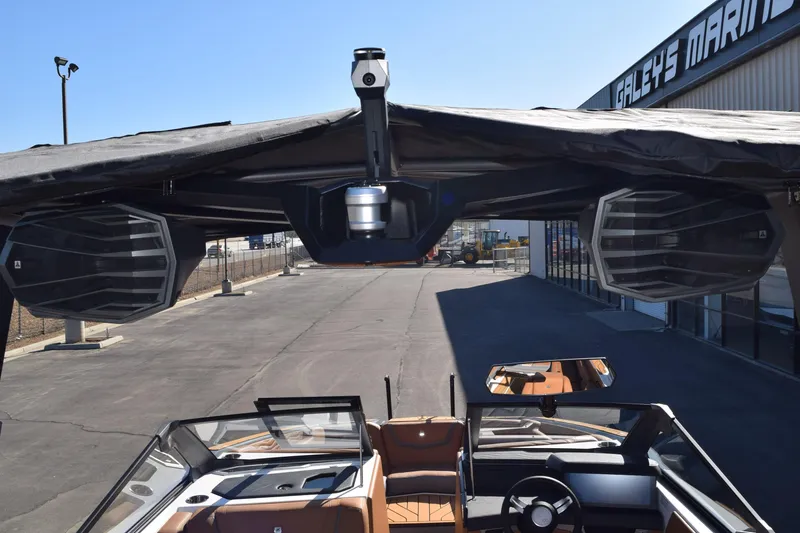 Slide: The Image of 2025 Nautique Super Air Nautique G23 Paragon boat with advanced sound system and sleek design. - 23