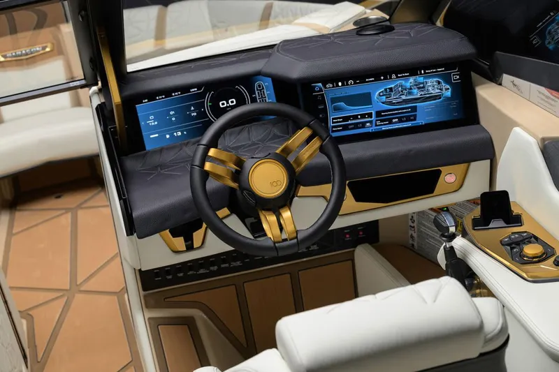Slide: The Image of Manufacturer Provided Image: 2025 Nautique Super Air Nautique G23 Paragon dashboard with advanced digital displays and luxurious steering wheel. - 29