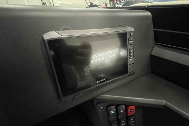 Slide: The Image of Garmin display on 2026 Alumacraft Competitor 175X Sport boat dashboard. - 11
