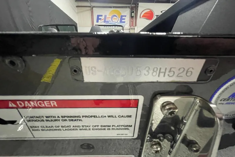 Slide: The Image of 2026 Alumacraft Competitor 175X Sport boat with visible warning label and serial number. - 15