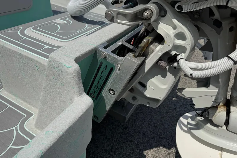 Slide: The Image of Close-up of 2025 Mowdy 16 Cat boat engine components and wiring. - 9