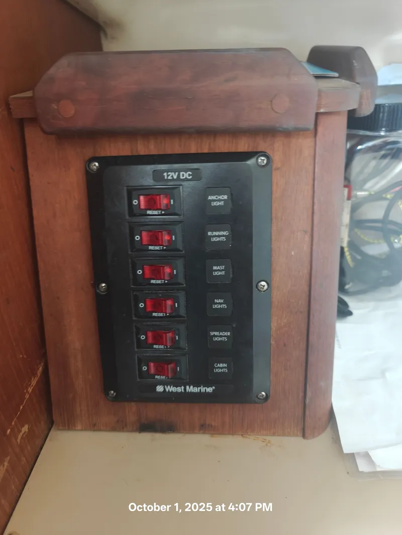 Slide: The Image of 12V DC switch panel on 1990 Hunter 27-2 boat by West Marine. - 27