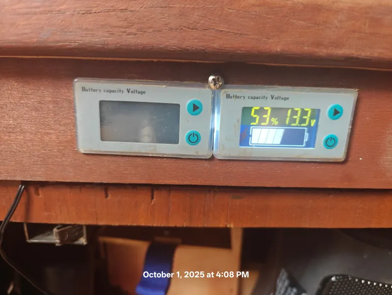 Slide: The Image of Battery voltage display showing 53% charge at 13.3V on a Hunter 27-2, 1990 model. - 30