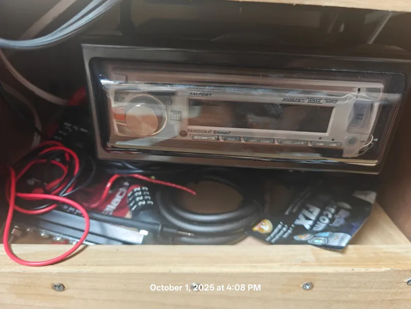 Slide: The Image of Stereo system in a 1990 Hunter 27-2 boat with cables and accessories. - 31