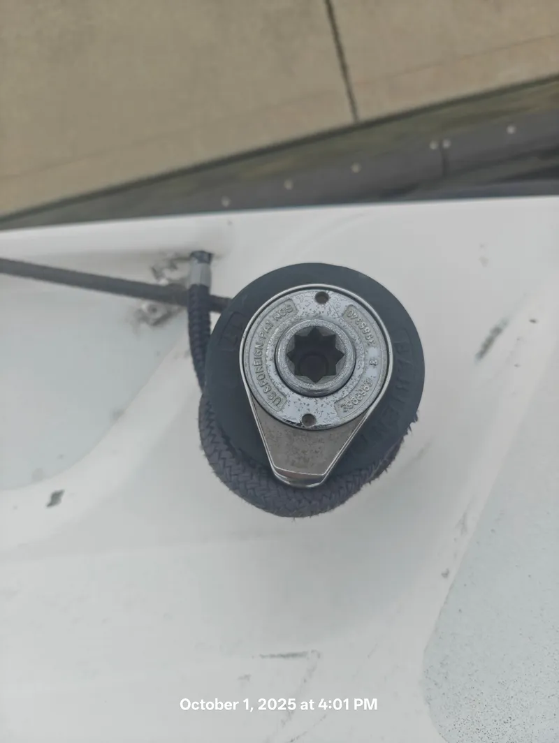 Slide: The Image of Close-up of a winch on a 1990 Hunter 27-2 sailboat deck. - 7