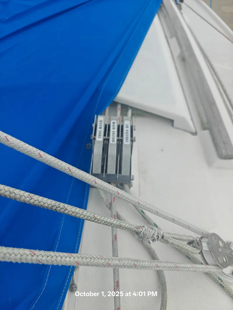 Slide: The Image of Sailboat deck with blue sail and rigging, Hunter 27-2, 1990 model. - 9