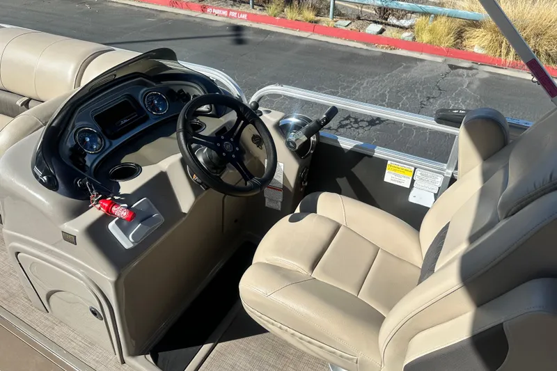 Slide: The Image of 2023 Sun Tracker Party Barge 22 RF XP3 interior with spacious seating and modern design. - 15