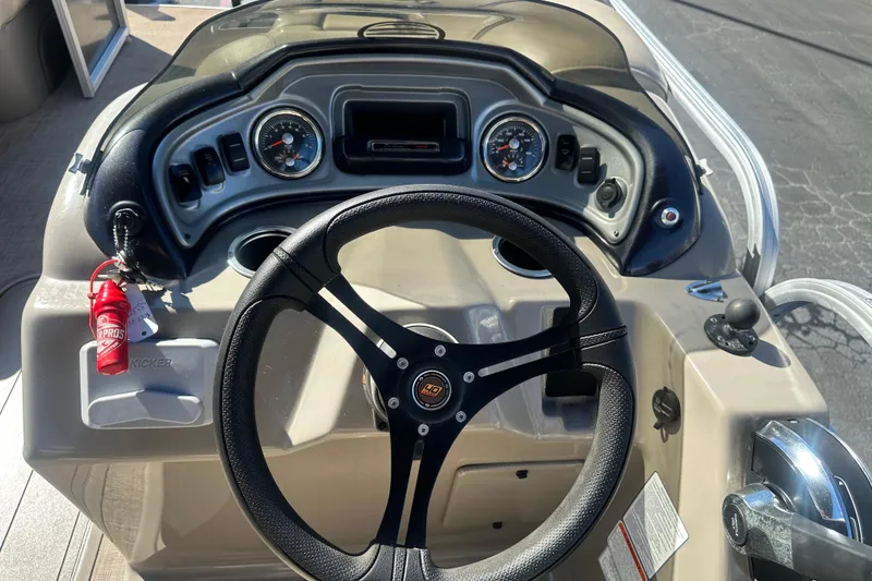 Slide: The Image of 2023 Sun Tracker Party Barge 22 RF XP3 storage compartment with open hatch. - 16