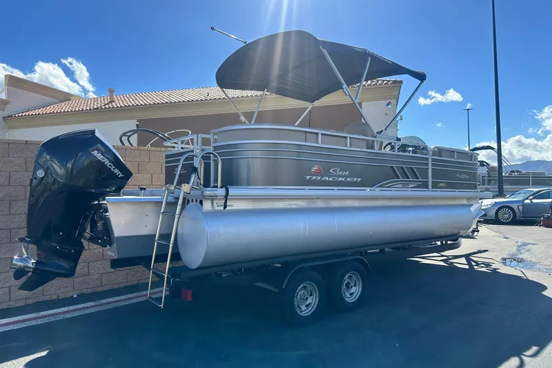 Slide: The Image of 2023 Sun Tracker Party Barge 22 RF XP3 pontoon boat on a trailer. - 3