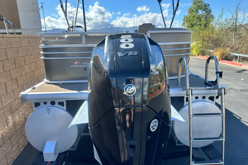 Slide: The Image of 2023 Sun Tracker Party Barge 22 RF XP3 pontoon boat with outboard motor and canopy. - 5