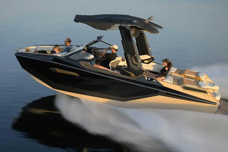 Slide: The Image of Manufacturer Provided Image: 2025 Nautique Super Air Nautique G23 Paragon cruising on water with passengers. - 17