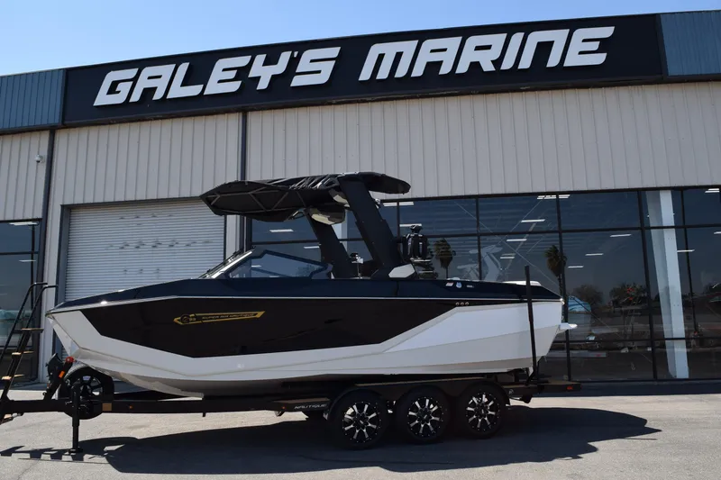 Slide: The Image of 2025 Nautique Super Air Nautique G23 boat at Galey's Marine dealership. - 2