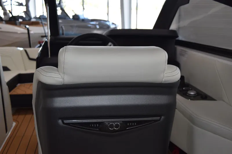 Slide: The Image of 2025 Nautique Super Air Nautique G23 interior with modern seating and controls. - 5