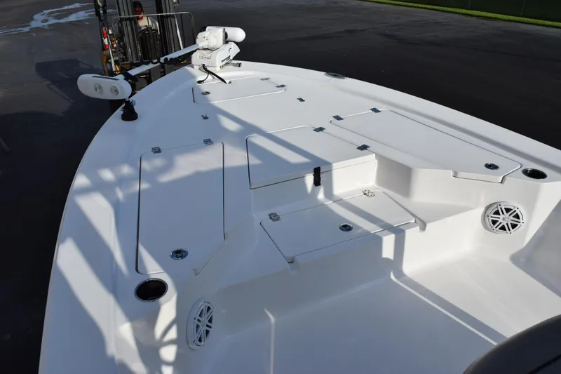 Slide: The Image of 2021 Sportsman Tournament 234 Bay Boat deck with storage compartments and speakers. - 14