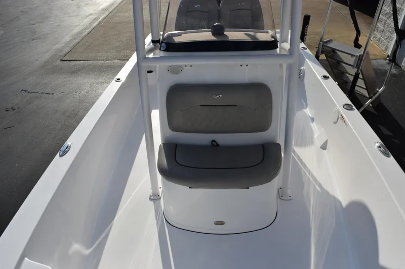 Slide: The Image of 2021 Sportsman Tournament 234 Bay Boat interior with seating and console. - 15