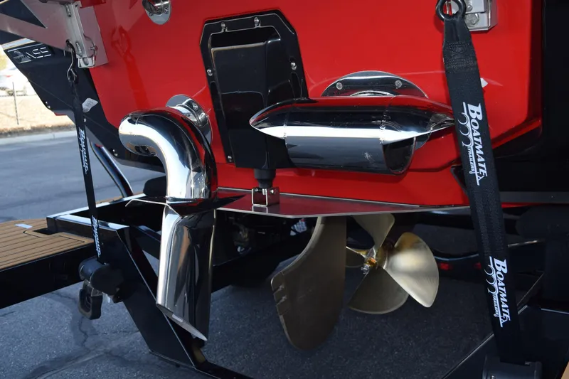 Slide: The Image of 2025 Nautique Super Air Nautique G23 boat propeller and exhaust detail. - 22