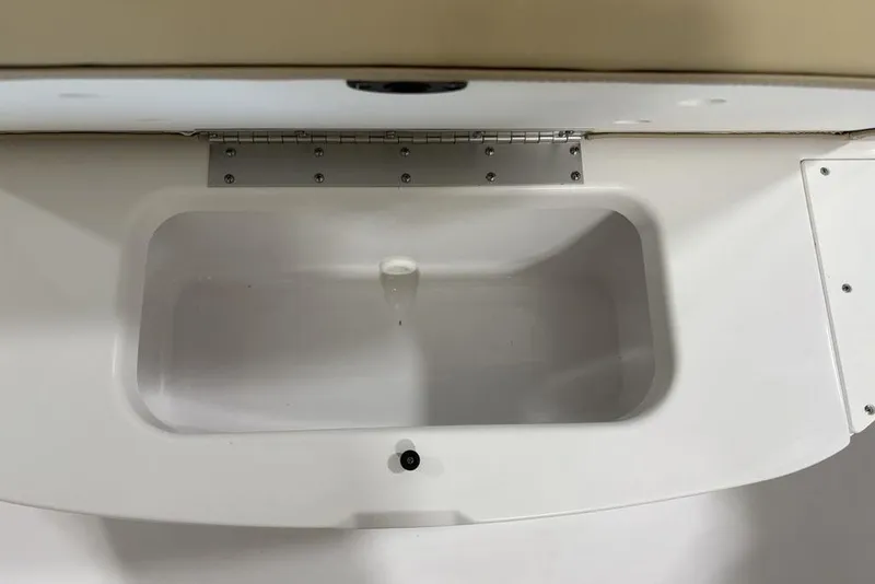 Slide: The Image of 2026 Sportsman Heritage 231 Center Console livewell interior view. - 12