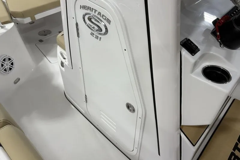 Slide: The Image of 2026 Sportsman Heritage 231 Center Console interior with seating and storage features. - 14