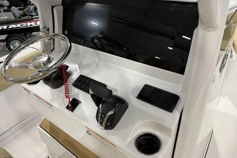 Slide: The Image of 2026 Sportsman Heritage 231 Center Console dashboard with steering wheel and controls. - 15