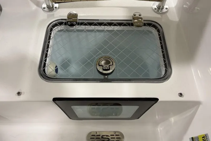Slide: The Image of Livewell compartment on 2026 Sportsman Heritage 231 Center Console boat. - 25